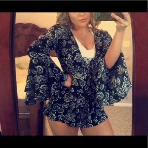 Floral long/belle sleeve romper